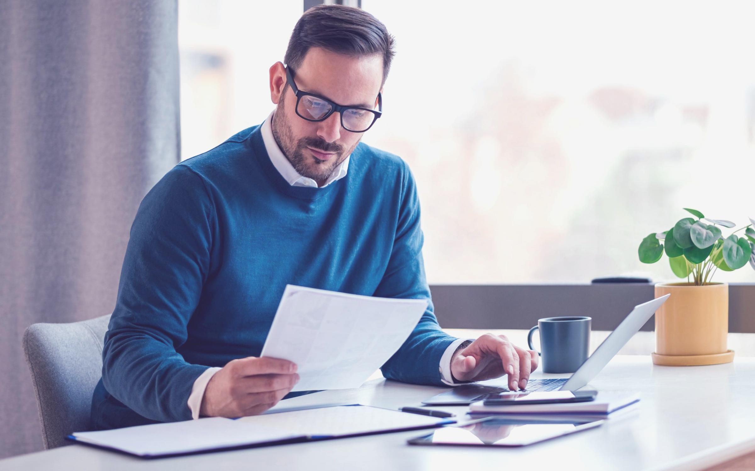 Financial analysis workspace with documents and data visualization tools